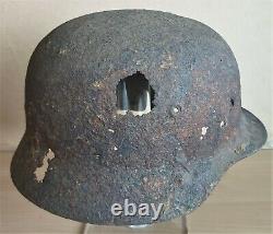 An Original WW-II German M. 40 Helmet Shell Recovered from a Hedge in Normandy