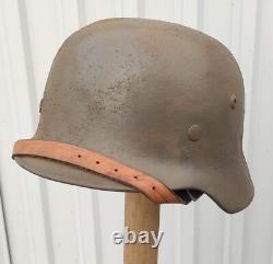 Helmet german original nice helmet M35 size 64 have a number WW2 WWII