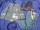 Original German WW2 tunic, trousers, boots, belt and buckle grouping lot WWII