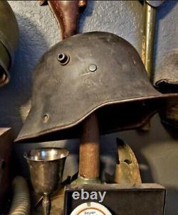 Original WW1 German to WW2 Transitional helmet. Named Finnish corporal