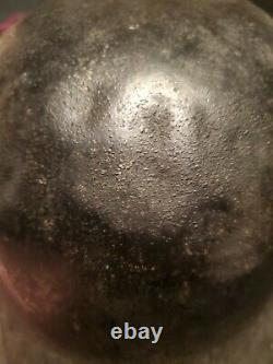 Original WW1 German to WW2 Transitional helmet. Named Finnish corporal