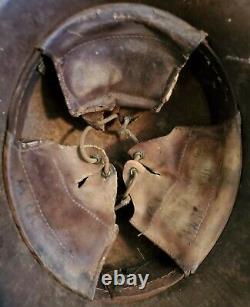 Original WW1 German to WW2 Transitional helmet. Named Finnish corporal