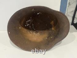 Original World War 1 German Steel Helmet in Relic condition repurposed in WW2