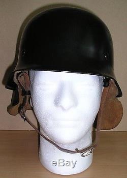 Unissued WW-II German Feuerwehr M. 34 steel helmet with original neck protector