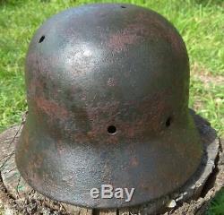 WW2 German Helmet M40/64 with bullet damage. Stahlhelm Original Relic
