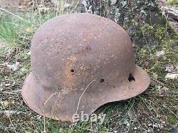 WW2 German original battledamaged helmet M42. CKL64