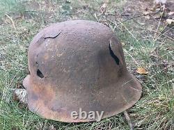 WW2 German original battledamaged helmet M42. CKL64