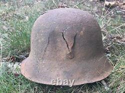 WW2 German original battledamaged helmet M42. CKL64