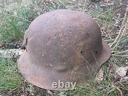 WW2 German original battledamaged helmet M42. CKL64