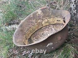 WW2 German original battledamaged helmet M42. CKL64