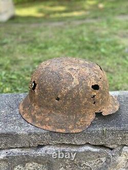 WW2 Original German M42 Battle Damage Helmet, From Battle Of Kurland