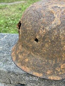 WW2 Original German M42 Battle Damage Helmet, From Battle Of Kurland