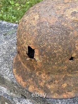 WW2 Original German M42 Battle Damage Helmet, From Battle Of Kurland