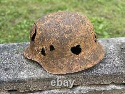 WW2 Original German M42 Battle Damage Helmet, From Battle Of Kurland