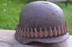 WW2 WWII Original German Helmet M35 (battle demages)from the battlefield. Kurland