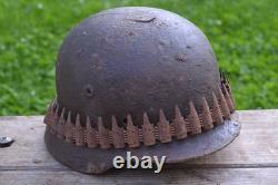 WW2 WWII Original German Helmet M35 (battle demages)from the battlefield. Kurland