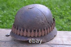 WW2 WWII Original German Helmet M35 (battle demages)from the battlefield. Kurland