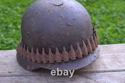 WW2 WWII Original German Helmet M35 (battle demages)from the battlefield. Kurland