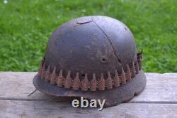 WW2 WWII Original German Helmet M35 (battle demages)from the battlefield. Kurland