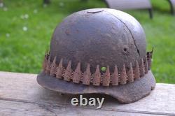 WW2 WWII Original German Helmet M35 (battle demages)from the battlefield. Kurland