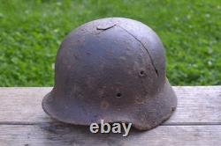 WW2 WWII Original German Helmet M35 (battle demages)from the battlefield. Kurland