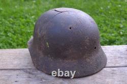 WW2 WWII Original German Helmet M35 (battle demages)from the battlefield. Kurland