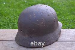 WW2 WWII Original German Helmet M35 (battle demages)from the battlefield. Kurland