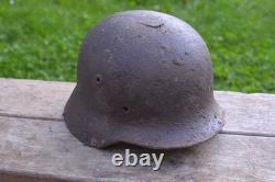 WW2 WWII Original German Helmet M35 (battle demages)from the battlefield. Kurland