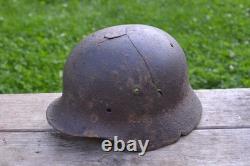 WW2 WWII Original German Helmet M35 (battle demages)from the battlefield. Kurland