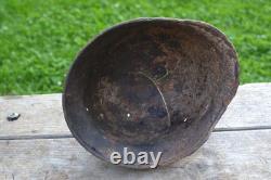 WW2 WWII Original German Helmet M35 (battle demages)from the battlefield. Kurland