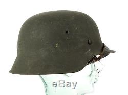 WWII German Army Model 1942 steel helmet with its original paintwork intact 58/9
